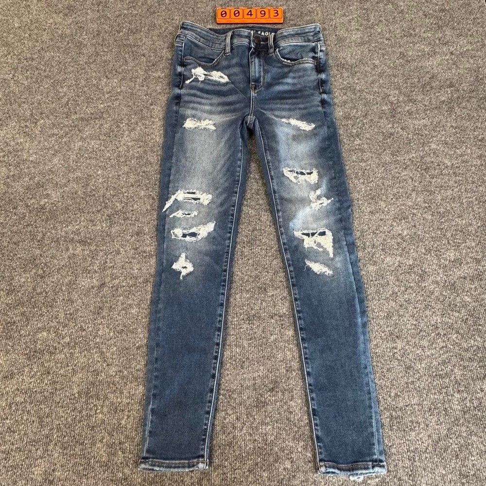 American Eagle Outfitters blue distressed skinny jeans with ripped details. 4.
